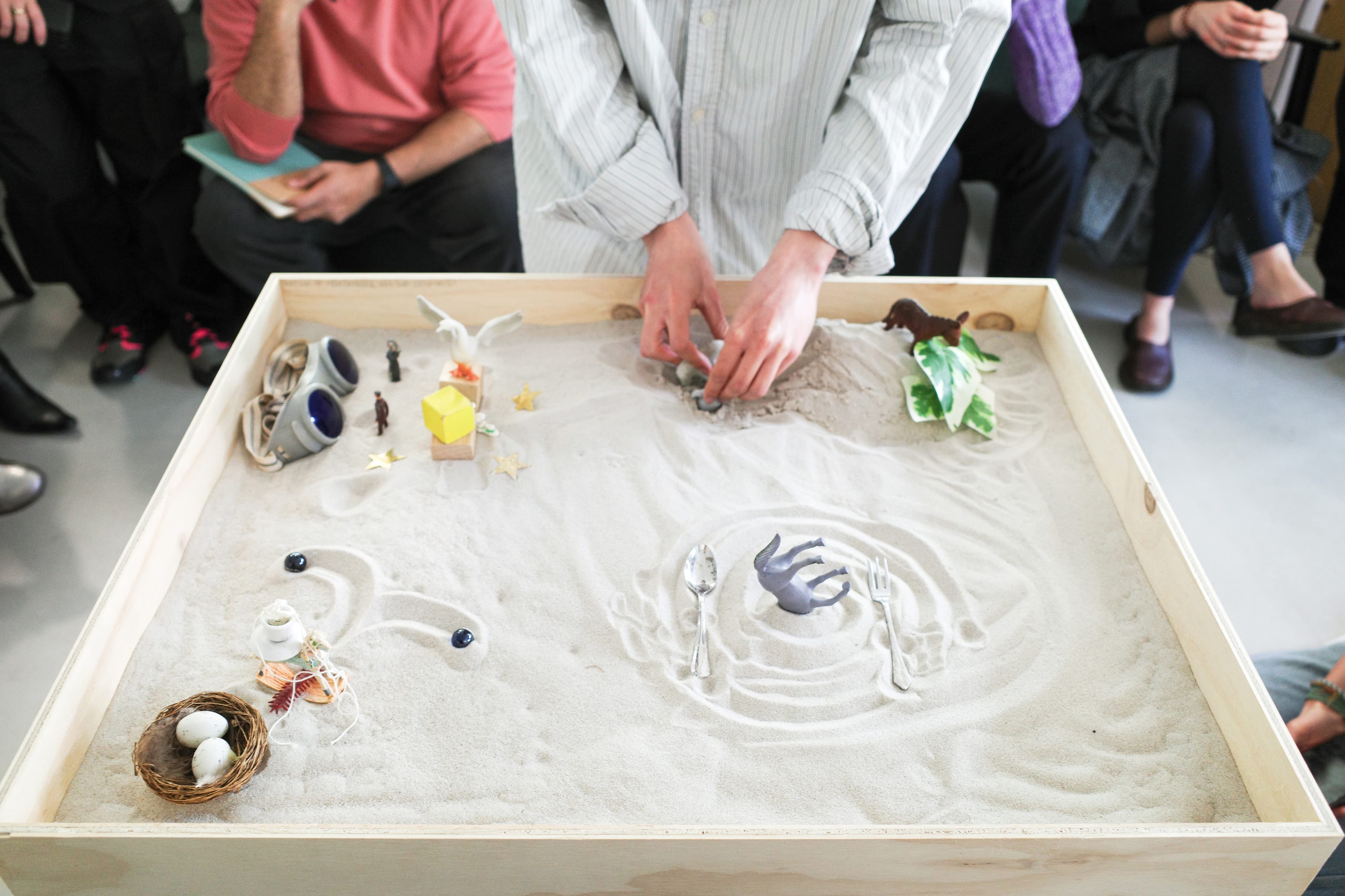 Through a public invitation, I hosted individual sessions within an intimate setting, inviting participants to donate a small item to an evolving library of objects. Each encounter began with a conversation where participants shared the memories and personal stories tied to their donated item. Afterward, they were invited to create their own tactile composition—a personal landscape—using the gathered objects from the library, translating a dream they had experienced the night before into a visual form.